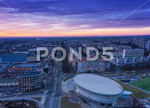 Sports complex Park Arena at sunset in Burgas, Bulgaria aerial, architecture, automobile, avenue, blue, boulevard, building, bulgaria, burgas, car, city, cityscape, cloud, destination, development, dynamic, drone, dusk, europe, evening, highway, landscape, light, outdoors, panorama, road, roadside, sky, skyline, sports complex, street, sun, swimming pool, traffic, transport, transportation, travel, town, twilight, urban, view