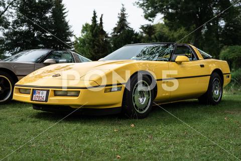 The sports car Chevrolet Corvette (C4) Targa Top, 1985. The exhibition of "US Car Classics". machine, chrome, ancient, antique, auto, automobile, car, design, germany, history, nostalgia, old, oldtimer, retro, transport, vehicle, vintage, Diedersdorf, US, USA, America, classics, 2-door, sports car, Chevrolet, Corvette, C4, Targa Top