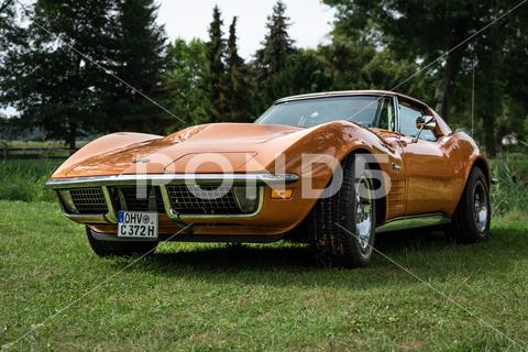 The sports car Chevrolet Corvette Stingray Coupe, 1972. The exhibition of "US Car Classics". machine, chrome, ancient, antique, auto, automobile, car, design, germany, history, nostalgia, old, oldtimer, retro, transport, vehicle, vintage, Diedersdorf, US, USA, America, classics, 2-door, sports car, Chevrolet, Corvette, Stingray, Coupe