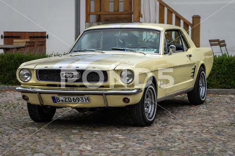 The sports car Ford Mustang Coupe, 1966. The exhibition of "US Car Classics". iconic, machine, chrome, ancient, antique, auto, automobile, car, design, germany, first generation, 2-door, history, nostalgia, old, oldtimer, retro, transport, vehicle, vintage, Ford, Mustang, sports car, coupe, Diedersdorf, US, USA, America, classics