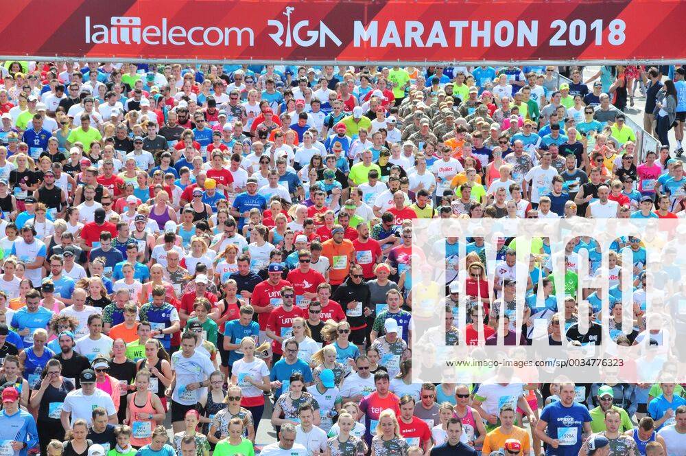 - SPORT (180521) -- RIGA, May 21, 2018 -- Marathon runners pass the start line during Lattelecom Riga Marathon 2018 in Riga, Latvia, on May 20, 2018. ) (SP)LATVIA-RIGA-MARATHON Janis