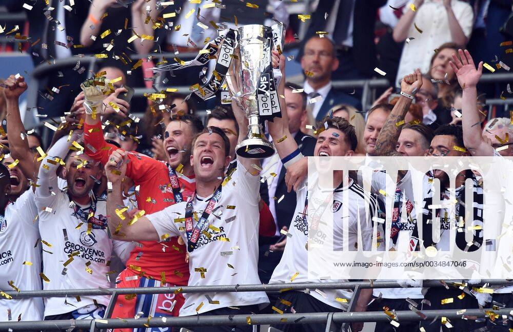 - SPORT Tom Cairney of Fulham and Kevin McDonald of Fulham celebrate with the cup at the end of the championship playoff final match at Wembley Stadium, London. Picture date 26th May 2018. Picture credit should read: Robin Parker Sportimage . RP1_6516