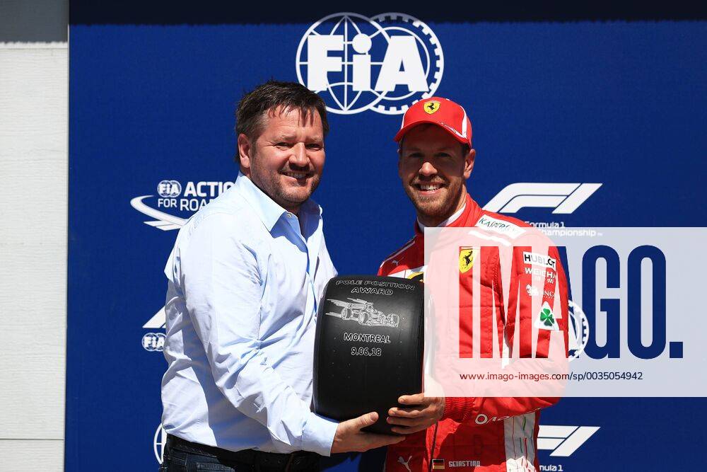 - SPORT 9th June 2018, Circuit Gilles-Villeneuve, Montreal, Canada; Canadian Formula One Grand Prix, qualification; Scuderia Ferrari, Sebastian Vettel takes pole and the pole trophy ActionPlus12035031 Octane