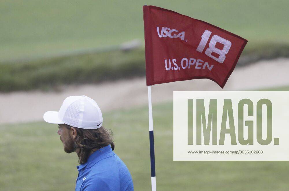 Tommy Fleetwood from England stand on the 18th green during a practice round on the Wednesday before the 118th U.S. Open Championship at Shinnecock Hills Golf Club in Southampton, New York on June 13, 2018. NYP20180613304 JOHNxANGELILLO
