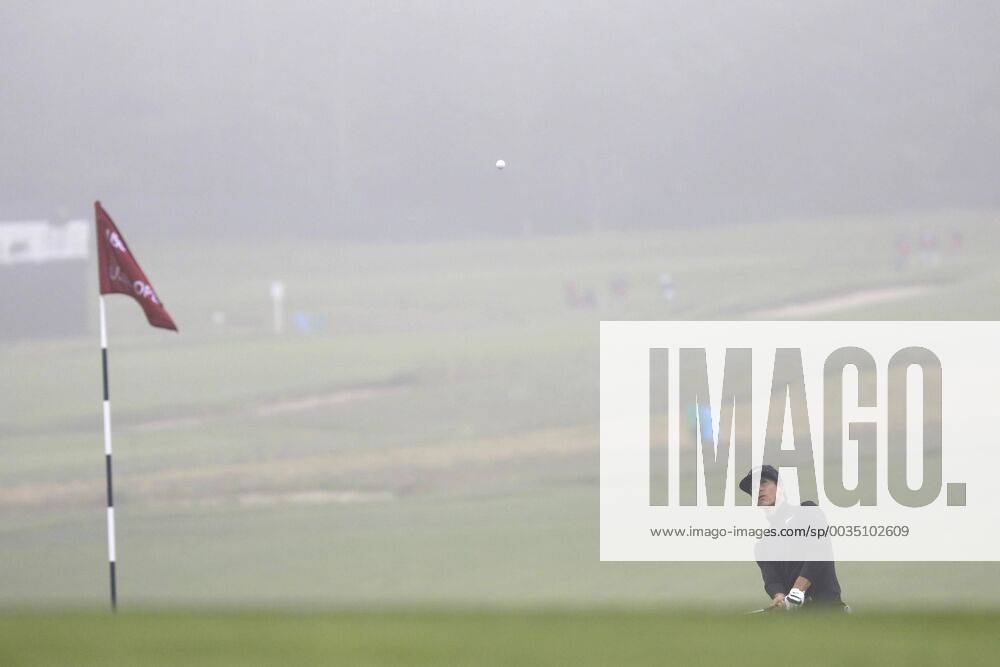 Thorbjorn Olesen of Denmark hits a pitch shot to the 9th green on the Wednesday before the 118th U.S. Open Championship at Shinnecock Hills Golf Club in Southampton, New York on June 13, 2018. NYP20180613306 JOHNxANGELILLO