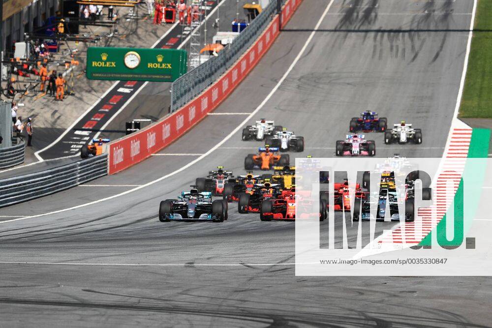 1st July 2018, Red Bull Ring, Spielberg, Austria; Austrian Formula One Grand Prix, Sunday race day; Mercedes AMG Petronas Motorsport, Valtteri Bottas, Lewis Hamilton and Scuderia Ferrari, Kimi Raikkonen go three wide into Turn 1 as Hamilton takes the lead ActionPlus12043161 LeannexBoon