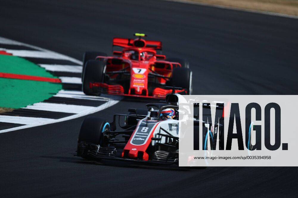 Romain Grosjean (Haas F1 Team) und Kimi Raikkoenen (Scuderia Ferrari) AUT, FIA, Formel 1, Grosser Preis von Grossbritannien Silverstone