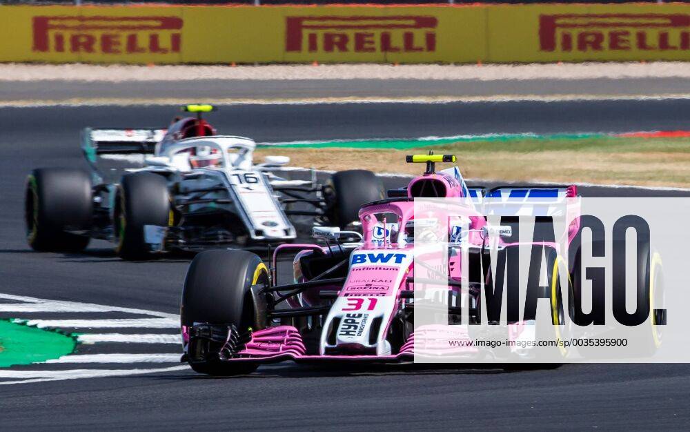 6th July 2018, Silverstone Circuit, Silverstone, England; British Formula One Grand Prix, Friday free practice; Test driver Nicholas Latifi in his Sahara Force India F1 Team Force India Mercedes VJM11 ahead of Charles Leclerc in his Alfa Romeo Sauber F1 Team Sauber Ferrari C37 ActionPlus12044456 TimxWilliams