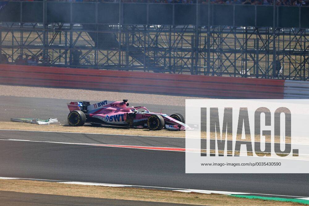 8th July 2018, Silverstone Circuit, Silverstone, England; British Formula One Grand Prix, Race Day; Sahara Force India, Sergio Perez locks up into Turn 1 and demolishes one of the trackside signs ActionPlus12045477 Octane