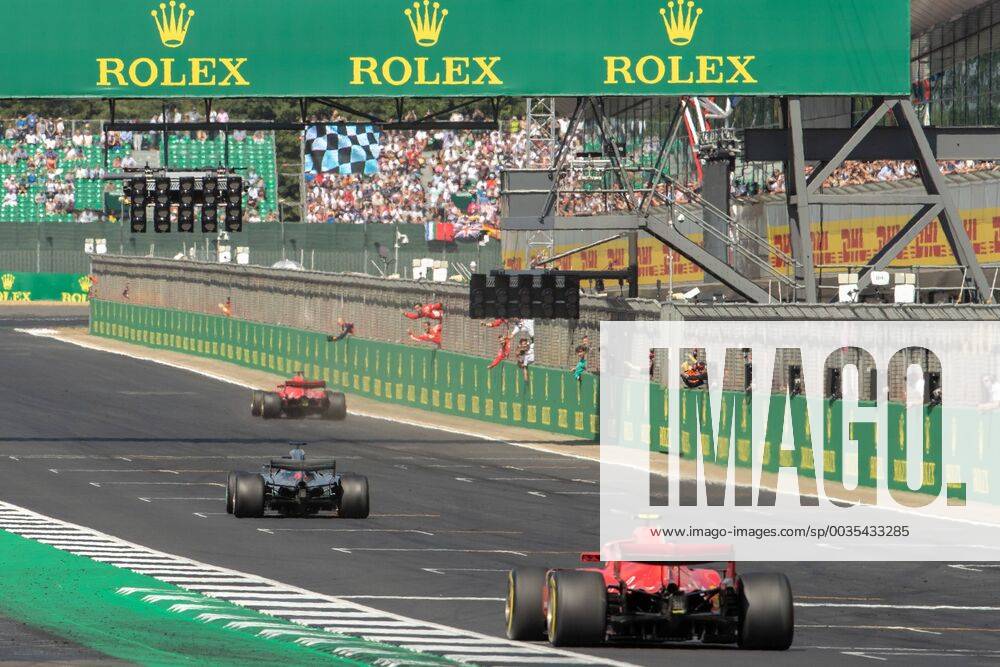 8th July 2018, Silverstone Circuit, Silverstone, England; British Formula One Grand Prix, Race Day; Scuderia Ferrari driver Sebastian Vettel celebrates with his team as Hamilton takes 2nd and Raikkonen 3rd ActionPlus12045543 TimxWilliams