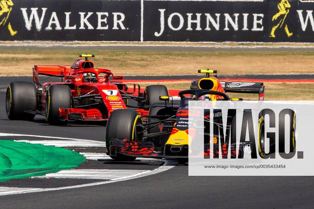 8th July 2018, Silverstone Circuit, Silverstone, England; British Formula One Grand Prix, Race Day; Max Verstappen in his Aston Martin Red Bull Racing Red Bull Racing TAG Heuer RB14 ahead of Kimi Raikkonen in his Scuderia Ferrari SF71H ActionPlus12045562 TimxWilliams