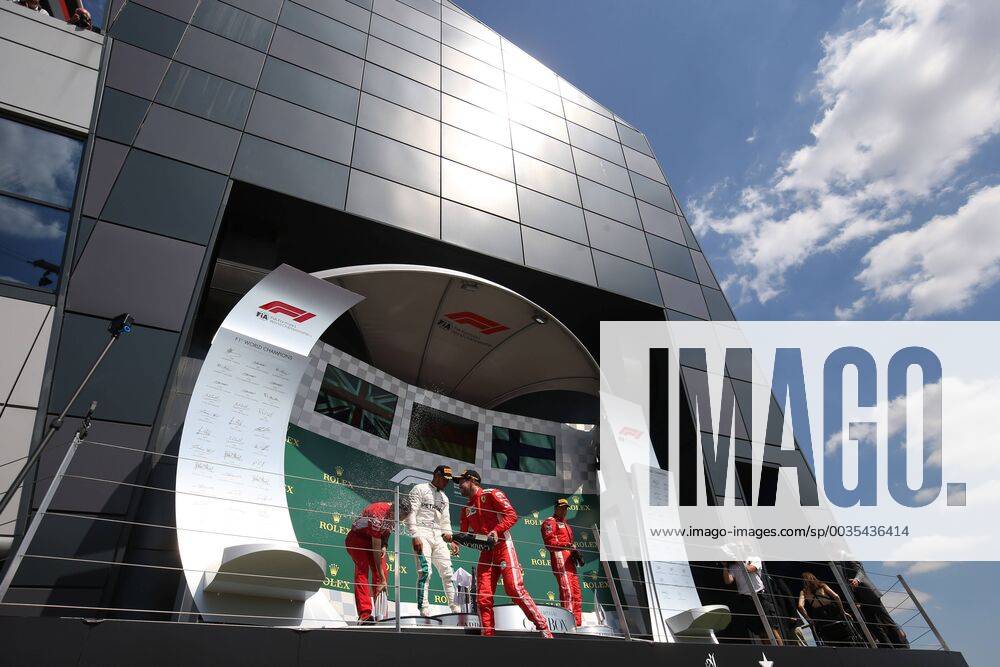 Photo4 LaPresse 08 07 2018 Silverstone, England Grand Prix Formula One England 2018 In the pic: Podium,winner Sebastian Vettel (GER) Scuderia Ferrari SF71H, 2nd place Lewis Hamilton (GBR) Mercedes AMG F1 W09, 3rd place Kimi Raikkonen (FIN) Scuderia Ferrari SF71H