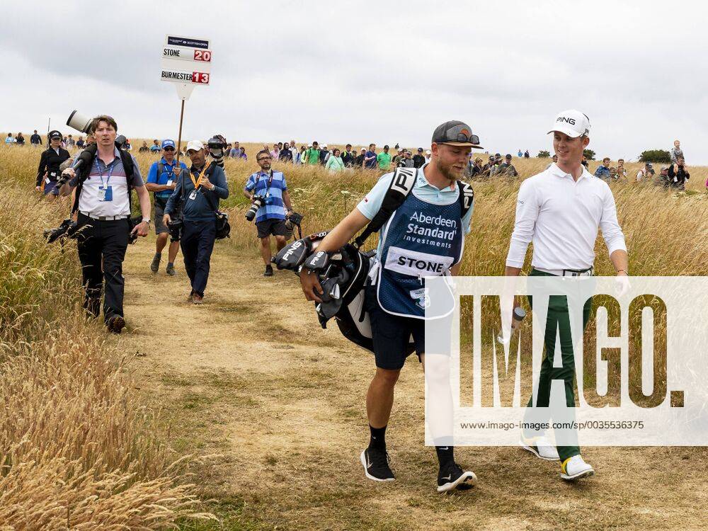 15th July 2018, Gullane Golf Club, Gullane, Scotland; Aberdeen Investments Scottish Open Golf, 4th round; Brandon Stone looking relaxed walking down to the 18th fairway with caddy with a closing round 60 ActionPlus12048158 AlanxRennie