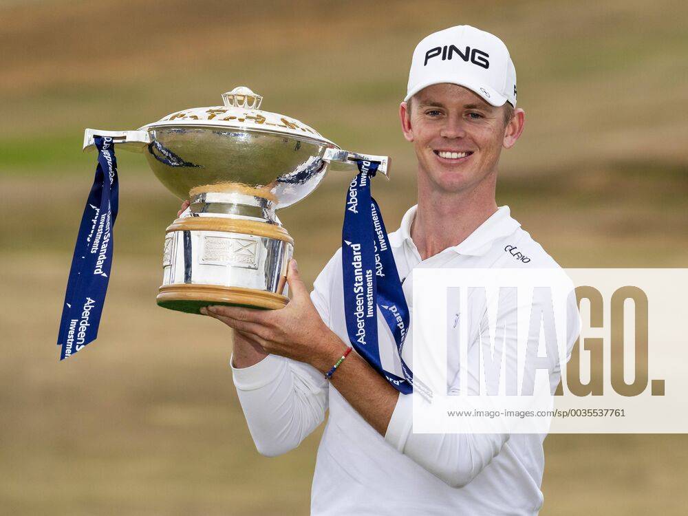 15th July 2018, Gullane Golf Club, Gullane, Scotland; Aberdeen Investments Scottish Open Golf, 4th round; Brandon Stone with the Aberdeen Investments Scottish Open Golf Trophy after winning with a score of -20 ActionPlus12048170 AlanxRennie