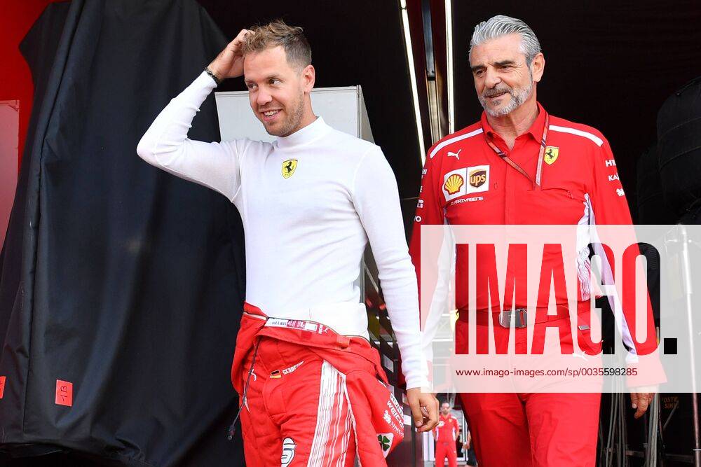 Sebastian VETTEL,GER (Scuderia Ferrari), mit Ferrari Teamchef Maurizio Arrivabene (ITA) auf dem Weg zur Box. Training, Formel 1:GP von DeutschlandDeutschland,Hockenheimring,Saison 2018,am 20.07.2018.