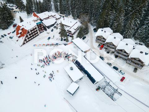 Aerial view jasna ski resort lines to chair lift copy space mountains, travel, aerial, mountain, mount, mountains range, peak, top, drone, overhead, top view, directly above, above, snowboarding, skiing, ski, helmet, goggles, ski goggles, winter, season, sport, activities, extreme, snow, snowing, snowed, white, frost, cold, landscape, scenic, nature, beauty in nature, rural, panoramic, chairlift, chair lift, line, crowd, slovakia, jasna, ski resort, tatra