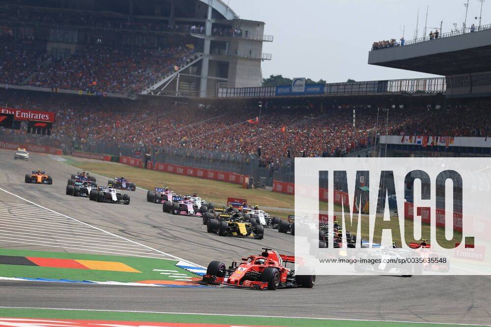 22nd July 2018, Hockenheimring, Hockenheim, Germany; German Formula One Grand Prix, Race Day; Scuderia Ferrari, Sebastian Vettel leads Bottas into Turn 1 after race start ActionPlus12049692 Octane
