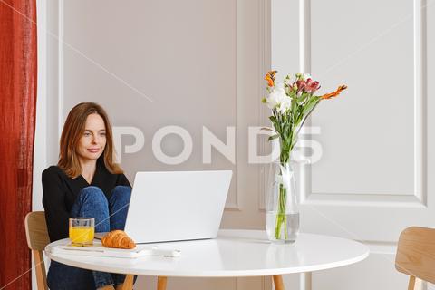 Cute woman watching movie on laptop in her apartment laptop, watching, computer, woman, technology, video, female, online, indoor, lifestyle, cyberspace, internet, home, media, movie, relax, digital, apartment, horizontal, music, smile, streaming, television, website, looking, table, leisure, broadcast, concert, multimedia, network, copy space, device, real people, wireless technology, cinema, cozy, enjoy, entertainment, stream, wireless