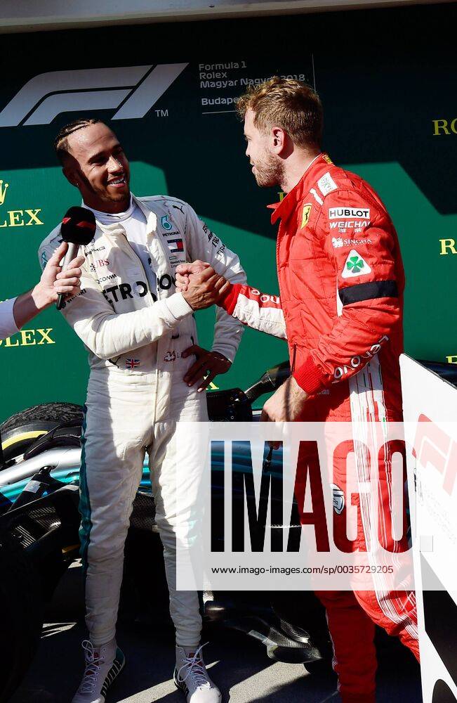 Lewis Hamilton; Mercedes Grand Prix, Sebastian Vettel, Scuderia Ferrari, formula 1 GP, Ungarn in Budapest, 29.07.2018 Photo:mspb Jerry Andre Lewis Hamilton; Sebastian Vettel, formula 1 GP, Ungarn 2018