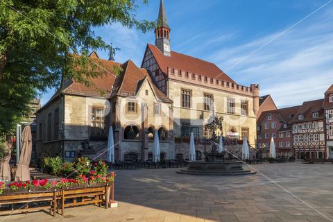 Old town hall in Goettingen with Gaenseliesel fountain and market square, Germany. More pictures from Goettingen in my collection old town hall, Goettingen, Gaenseliesel, Gothic, marketplace, old town, landmark, pedestrian zone, university town, medieval, historical, architecture, arcades, balcony, fountain, Germany, shopping, shopping street, bay window, half-timbered, facade, buildings, shops, houses, sky, Leine, Middle Ages, Lower Saxony, town center, town hall, sandstone, sights, sunlight, town, town houses, tower, clouds, battlements, old, architectural, blue, fugaengerzone, horizontal, nobody, city hall Translated with www.DeepL.com, Translator free version