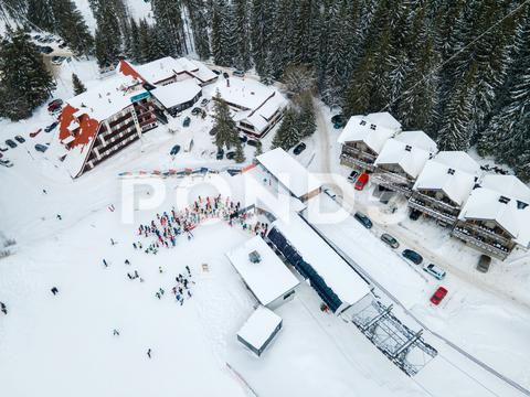 Aerial view jasna ski resort lines to chair lift copy space mountains, travel, aerial, mountain, mount, mountains range, peak, top, drone, overhead, top view, directly above, above, snowboarding, skiing, ski, helmet, goggles, ski goggles, season, sport, activities, extreme, snow, snowing, snowed, white, frost, cold, landscape, scenic, nature, beauty in nature, rural, panoramic, chairlift, chair lift, line, crowd, slovakia, jasna, ski resort, tatra