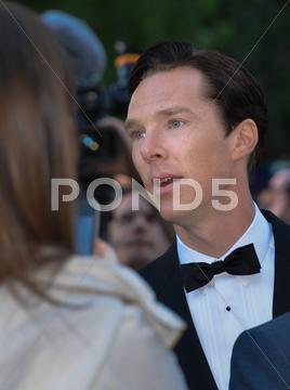 cast member benedict cumberbatch arrives for the premiere of the fifth estate at the 38th toronto international film festival on september 5, 2013. the movie is based on the true-life story of wikileaks founder julian assange. 2013,actors,canada,carpet,celebrity,cinema,crowd,editorial,entertainment,event,famous,fans,festival,film,film festival,hollywood,movie,people,photo,photocall,premier,premiere,red,september,star,tiff,toronto