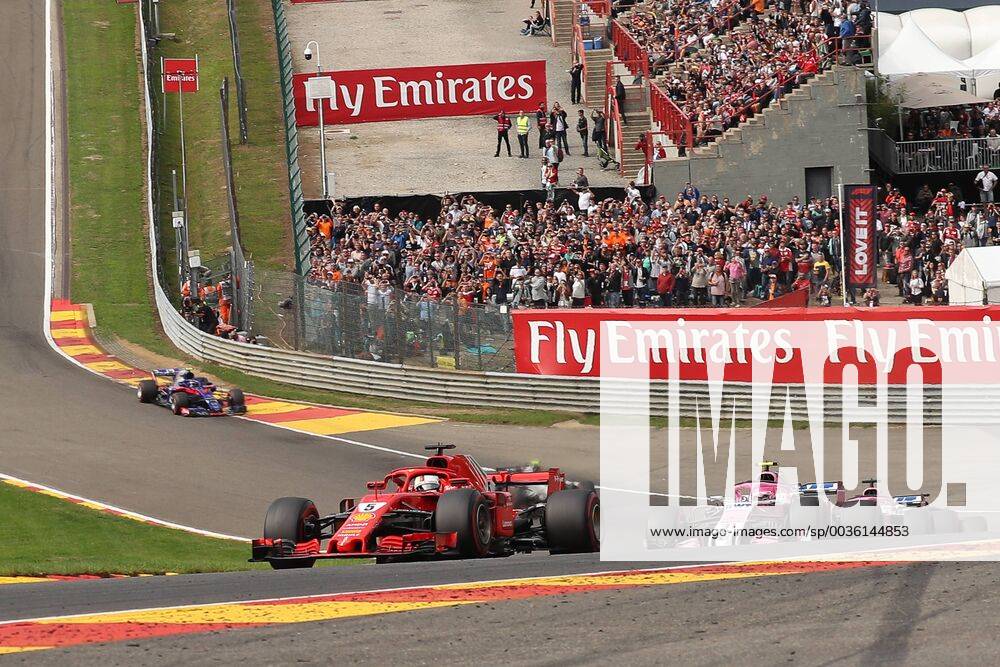 Ferrari s German driver Sebastian Vettel and Force India s French driver Esteban Ocon pictured in action during the Spa-Francorchamps Formula One Grand Prix of Belgium race, in Spa-Francorchamps, Sunday 26 August 2018. BRUNOxFAHY x05414244x