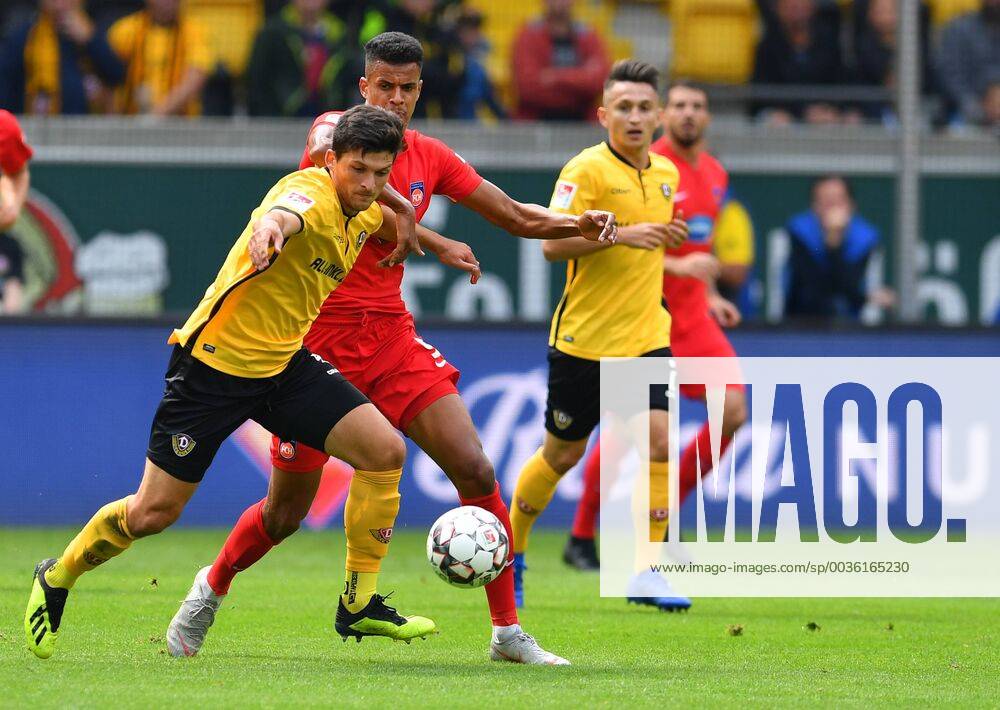 Fussball, GER, Saison 2018 2019, 2. Bundesliga, 1. Spieltag, DDV-Stadion Dresden, SG Dynamo Dresden - 1. FC Heidenheim, Jannis Nikolaou (Dresden), dahinter Robert Glatzel (Heidenheim), DFL REGULATIONS PROHIBIT ANY USE OF PHOTOGRAPHS as IMAGE SEQUENCES and or QUASI-VIDEO,