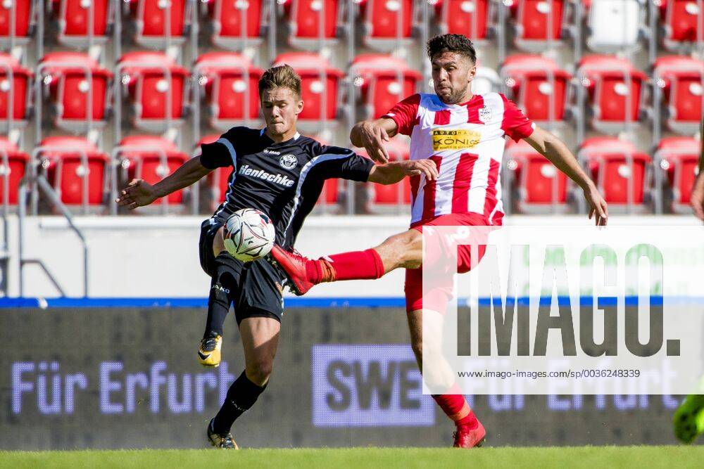 FUSSBALL REGIONALLIGA NORDOST -SAISON 2017 2018 - SPIELTAG 6 - ERFURT-BAUTZEN 01 09 2018 - Erfurt: Andis Shala 9 (FC Rot-Weiß Erfurt) gegen Mateusz Ciapa 14 (Budissa Bautzen) im Fussball-Regionalliga Nordost Spiel des FC Rot-Weiß Erfurt gegen Budissa Bautzen am 1. September 2018 im Steigerwaldstadion Erfurt. Gemäß den Vorgaben der DFL Deutsche Fußball Liga ist es untersagt, in dem Stadion und oder vom Spiel angefertigte Fotoaufnahmen in Form von Sequenzbildern und oder videoähnlichen Fotostrecken zu verwerten bzw. verwerten zu lassen. DFL regulations prohibit any use of photographs as image sequences and or quasi-video. _________________