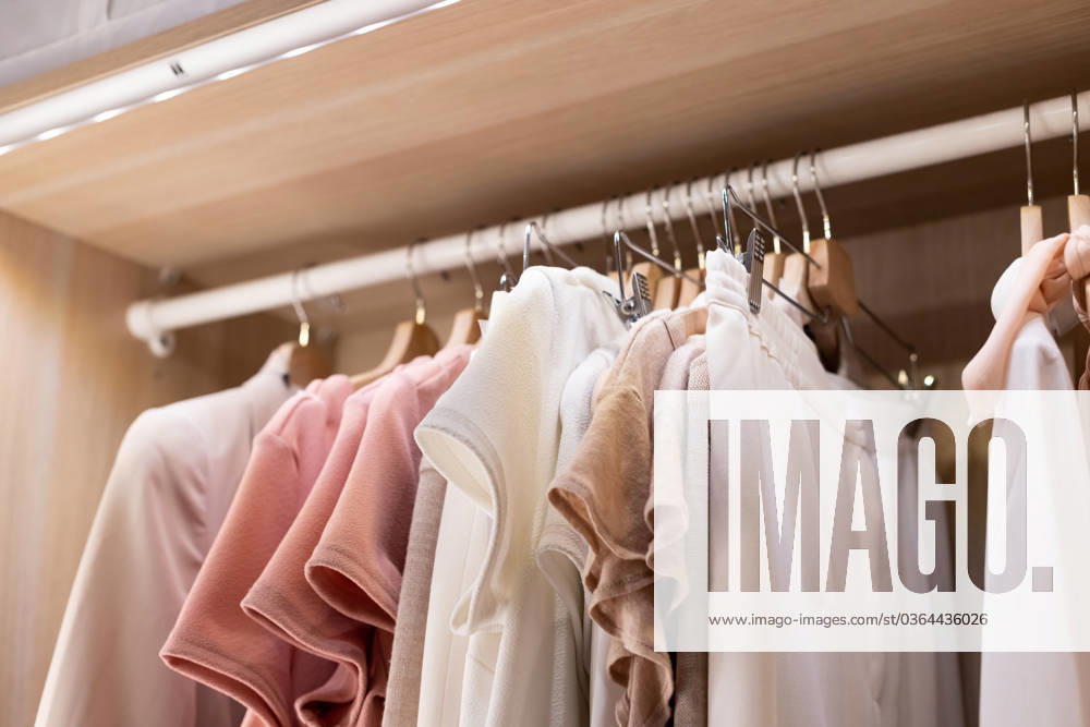 Clothes on a rail in a wardrobe. Seasonal capsule for easy dressing, order in things, cleaning out , 43941750.jpg, storage, wardrobe, clothes, home, closet, style, clothing, fashion, apparel, order, perfectionist, shirt, room, garment, shelf, clean, hanger, folded, box, rack, wear, textile, household, organizer, design, store, neatly, method, shop, minimalism, dress, general cleaning, konmary, armoire, basket, container, maintaining, spring cleaning, contemporary, organized, retail, fabric, sale, blanket, cover, clear out, collection, tidying up, cleaning, filing RECORD DATE NOT STATED
