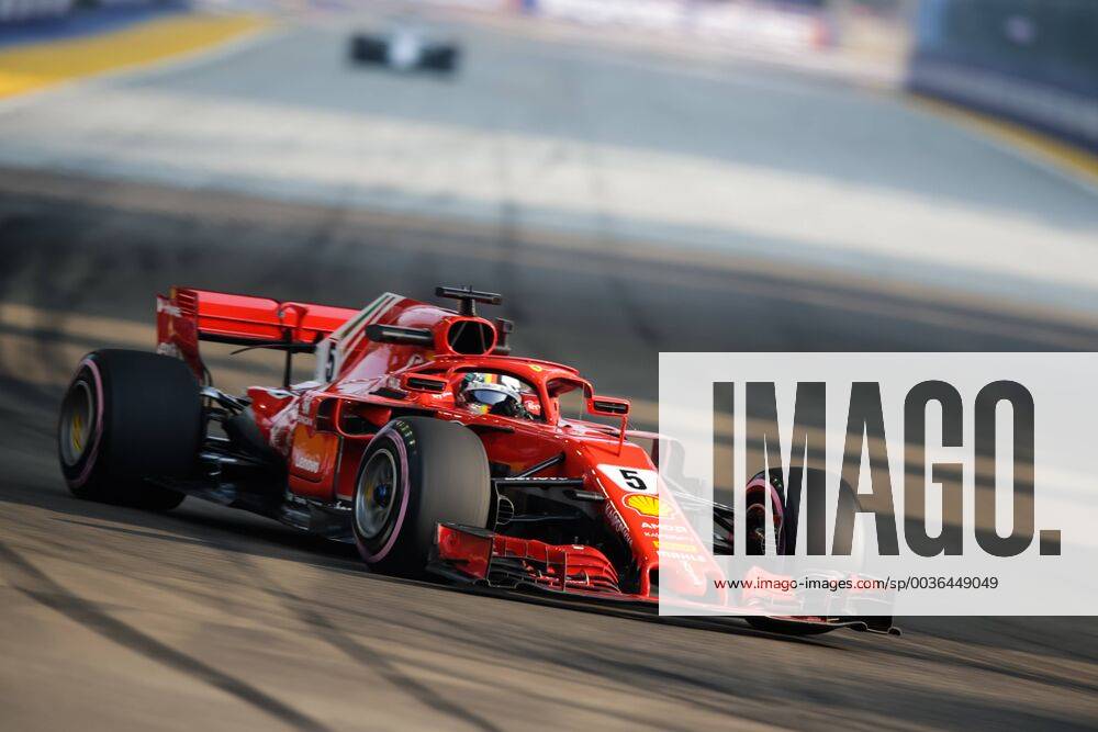 14th September 2018, Marina Bay Street Circuit, Singapore; Formula One Grand Prix of Singapore, Friday free practice; Scuderia Ferrari driver Sebastian Vettel ActionPlus12062020 StephenxBlackberry