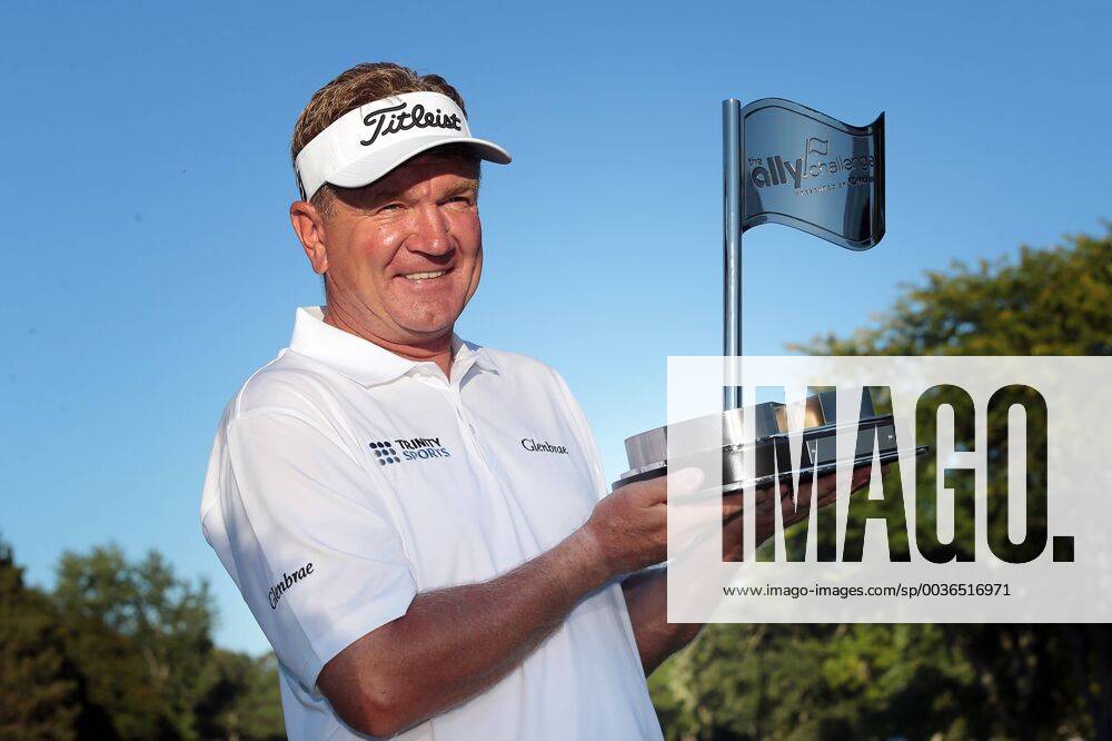 Grand Blanc, Michigan, United States - Paul Broadhurst of England holds up the trophy after winning The Ally Challenge presented by McLaren at Warwick Hills Golf & Country Club in Grand Blanc, MI, USA Sunday, September 16, 2018. The Ally Challenge - Final Round - ZUMAn230 20180916_zaa_n230_983
