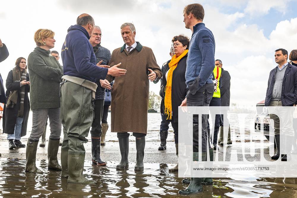 West-Flanders province governor Carl Decaluwe and King Filip of Belgium pictured during a visit to farm t Madeliefje in Merkem, Houthulst, near the De Blankaart reserve, heavily touched by the floods in West Flanders, Friday 17 November 2023. The river Yser (Ijzer) has reached alarm levels at several sites in the Westhoek region after days of heavy rain. JAMESxARTHURxGEKIERE 80199158