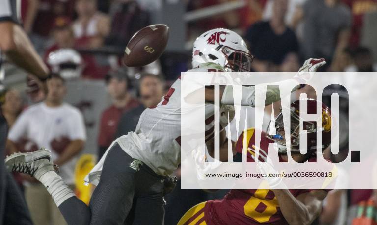 Los Angeles, California, U.S - Washington State s safety Skyler Thomas (25) was called for pass interference on USC s wide receiver Amon-Ra St. Brown (8) during the first half against Washington State at the Los Angeles Coliseum on September 21, 2018 NCAA College League USA Footbal 2018: USC : Washington State - ZUMAg199 20180921_zap_g199_015