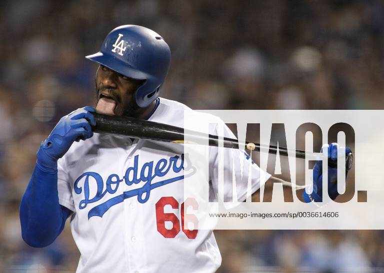 Los Angeles, California, U.S - Yasiel Puig 66 of the Los Angeles Dodgers licks his bat during their game with the San Diego Padres on Saturday September 22, 2018 at Dodger Stadium in Los Angeles, California. Dodgers defeat Padres, 7-2. Dodgers defeat Padres, 7-2 - ZUMAp124 20180922_zaa_p124_025