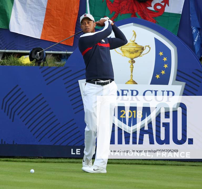 Tiger Woods prepares his opening shot on the first tee at the start of the Ryder Cup at Le Golf National in Guyancourt near Paris on September 28, 2018. Team USA will compete against Team Europe in the three-day tournament. PAR20180928063 DAVIDxSILPA