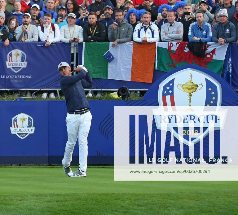 Brooks Koepka hits his opening shot on the first tee at the start of the Ryder Cup at Le Golf National in Guyancourt near Paris on September 28, 2018. Team USA will compete against Team Europe in the three-day tournament. PAR20180928081 DAVIDxSILPA