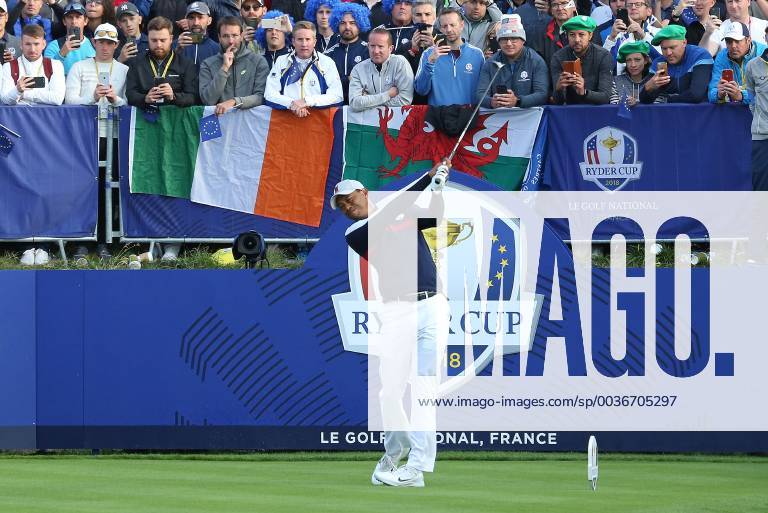 Tiger Woods hits his opening shot on the first tee at the start of the Ryder Cup at Le Golf National in Guyancourt near Paris on September 28, 2018. Team USA will compete against Team Europe in the three-day tournament. PAR20180928087 DAVIDxSILPA