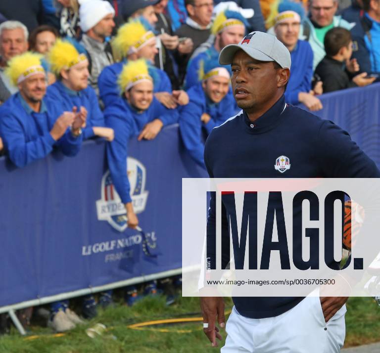Tiger Woods walks towards the fairway after hitting his opening shot on the first tee at the start of the Ryder Cup at Le Golf National in Guyancourt near Paris on September 28, 2018. Team USA will compete against Team Europe in the three-day tournament. PAR20180928090 DAVIDxSILPA