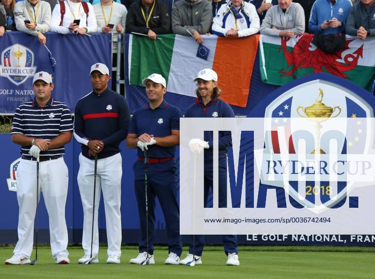 (From L to R) Patrick Reed, Tiger Woods, Francesco Molinari and Tommy Fleetwood arrive on the first tee before the start of the Ryder Cup at Le Golf National in Guyancourt near Paris on September 28, 2018. PAR20180929108 DAVIDxSILPA