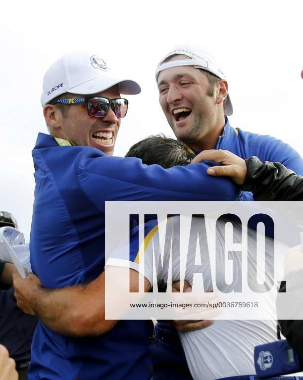 Jon Rahm (R) of Spain celebrates with Italian Francesco Molinari (C) and Paul Casy (L) after Europe Team win on the final day of the Ryder Cup 2018 at The Golf National in Guyancourt, near Paris, France, 30 September 2018. Ryder Cup 2018 - Europe vs USA !ACHTUNG: NUR REDAKTIONELLE NUTZUNG!