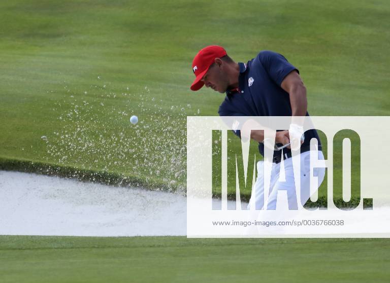 Brooks Koepka hits out of the sand bunker on the final day of competition of the Ryder Cup at Le Golf National in Guyancourt near Paris on September 30, 2018. Team Europe defeated Team USA 17.5 to 10.5 to hand the Americans their sixth straight loss on foreign soil. PAR20180930041 DAVIDxSILPA