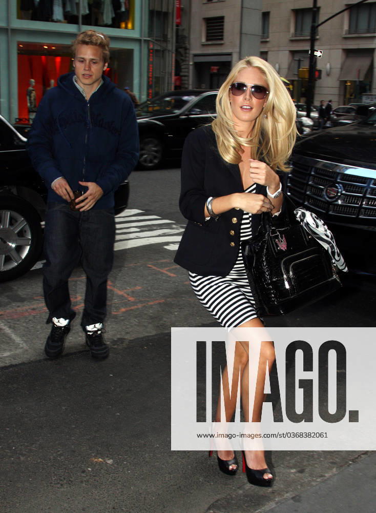 RESTRICTIONS APPLY Heidi Montag and Spencer Pratt are in New York to promote Heidi s new clothing line, Heidiwood 21174, NEW YORK, NEW YORK - Monday April 14 2008. UK AND NORTH AMERICAN USE ONLY Heidi Montag and Spencer Pratt are in New York to promote Heidi s new clothing line, Heidiwood. The couple, who both star in the popular reality TV show called The Hills , headed to Barney s New York on Madison Ave for some shopping after making appearances on MTV s TRL show. Heidi was sporting a black crocodile skin handbag from the her new fashion range, Heidiwood, which begins selling in stores tomorrow. Photograph: PacificCoastNews.com UK OFFICE: +44 131 225 3333 3322 US OFFICE: 1 310 261 9676,
