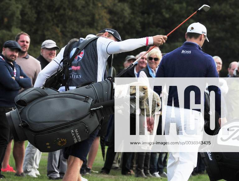 Golf - 2018 Sky Sports British Masters - Thursday, First Round Martin Kymer of Germany with his caddie and animal club covers , at Walton Heath Golf Club. COLORSPORT ANDREW COWIE