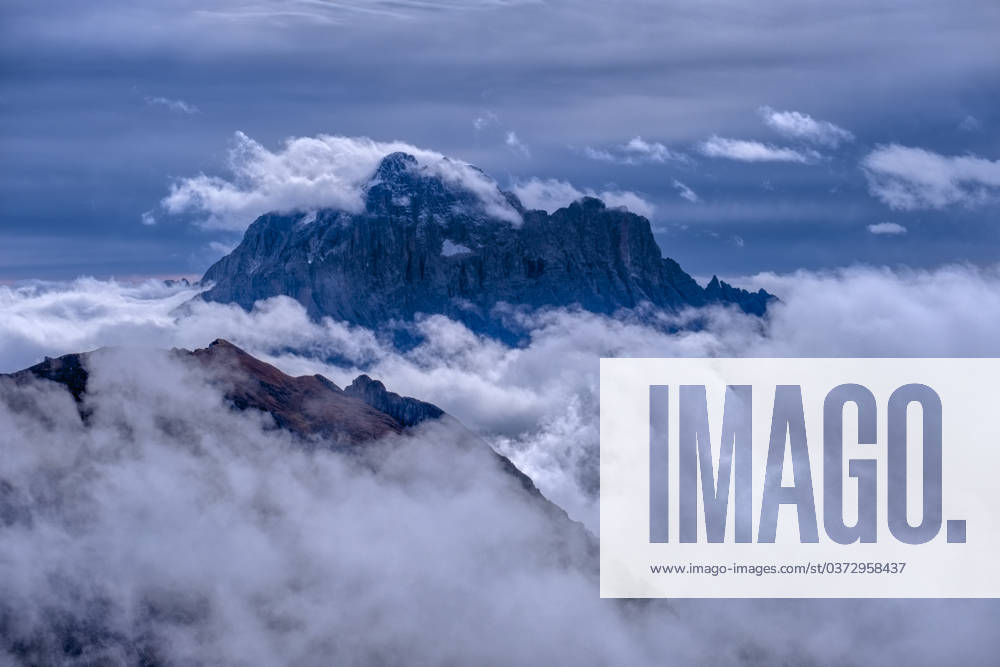 The summit of Monte Civetta, valleys covered in clouds in autumn, seen from the mountain hut Rifugio Nuvolau. Cortina d Ampezzo Veneto Italy FB_2023_3257