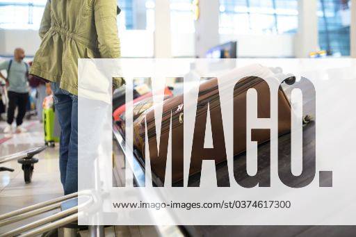 The luggage belt with suitcases being delivered to the passengers at the arrival terminal 22226014 RECORD DATE NOT STATED