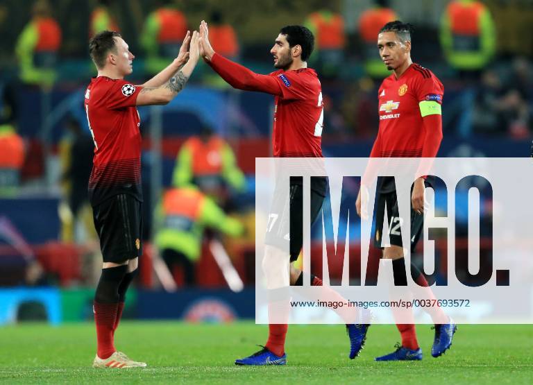 Manchester United ManU s Marouane Fellaini celebrates with Phil Jones at full time during the UEFA Champions League match at Old Trafford, Manchester. Picture date 27th November 2018. Picture credit should read: Matt McNulty Sportimage .