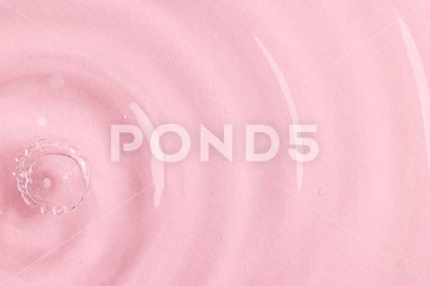 Close up of water drop falling into water with ripples and copy space on pink background. Water, liquid and colour concept. No People Close Water Drop Falling Water Ripple Copy Space Pink Background Liquid Colour Concept Drop Splash Abstract Design Background Wet Flow Fluid Closeup Wave Illustration Macro Business Graphic Symbol Isolated Flowing Color Clean Drink Water Falling Copy Space Pink