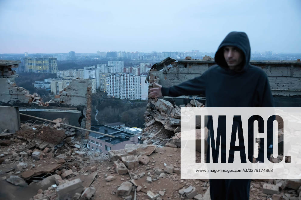 Russian drone attack on residential building in Kyiv, Ukraine - 22 Dec 2023 A man seen standing and pointing where the drone attack on a residential building in Kyiv damaged. At least two people were injured after a Russian drone attack hit a residential building in Kyiv, for the third time.Russia s Shahed type drone hit a residential building in the Ukrainian capital. Kyiv Ukraine