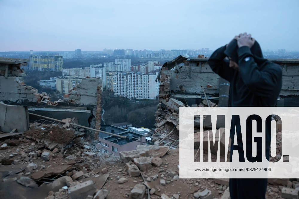 Russian drone attack on residential building in Kyiv, Ukraine - 22 Dec 2023 A man stands while worrying at the site of a drone attack on a residential building in Kyiv. At least two people were injured after a Russian drone attack hit a residential building in Kyiv, for the third time.Russia s Shahed type drone hit a residential building in the Ukrainian capital. Kyiv Ukraine